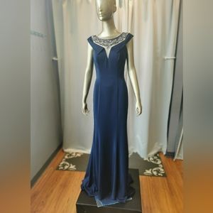 Navy size 8 high neck line formal/evening/black tie gown with keyhole back